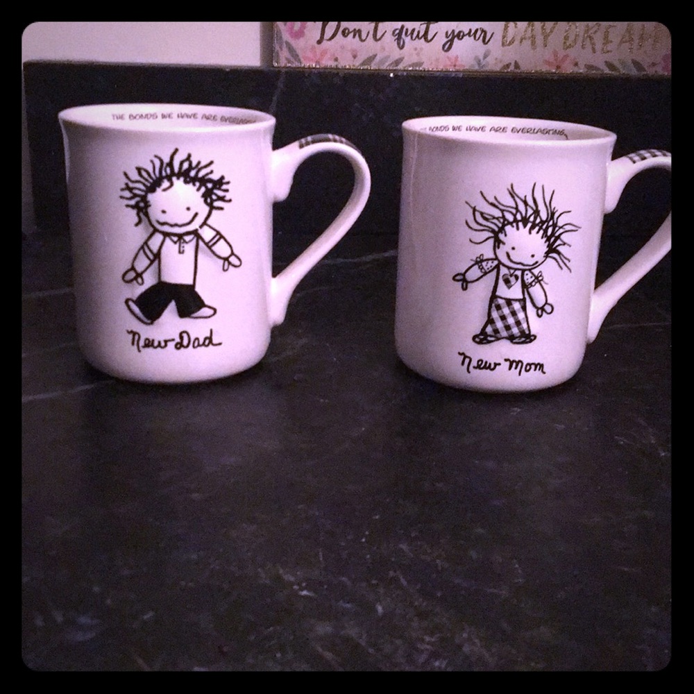 Marci mugs new Mom and Dad